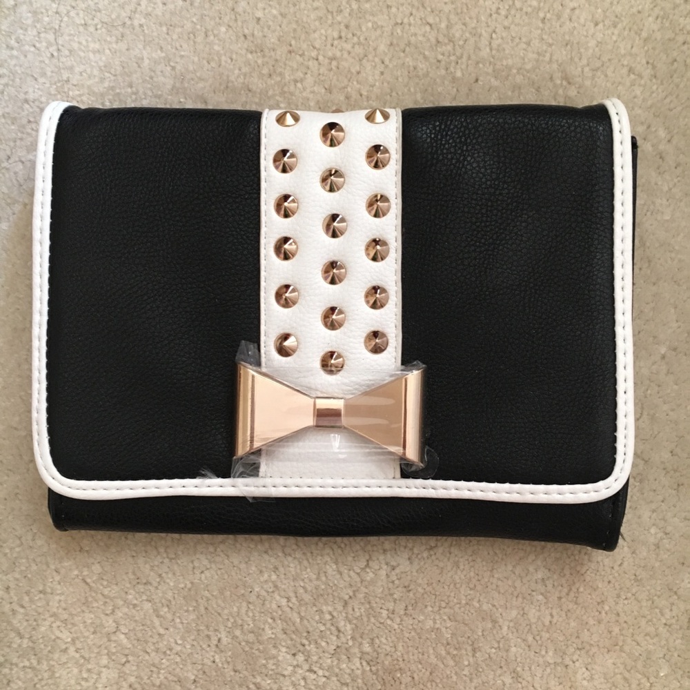 Gold bow studded clutch with removable chain strap
